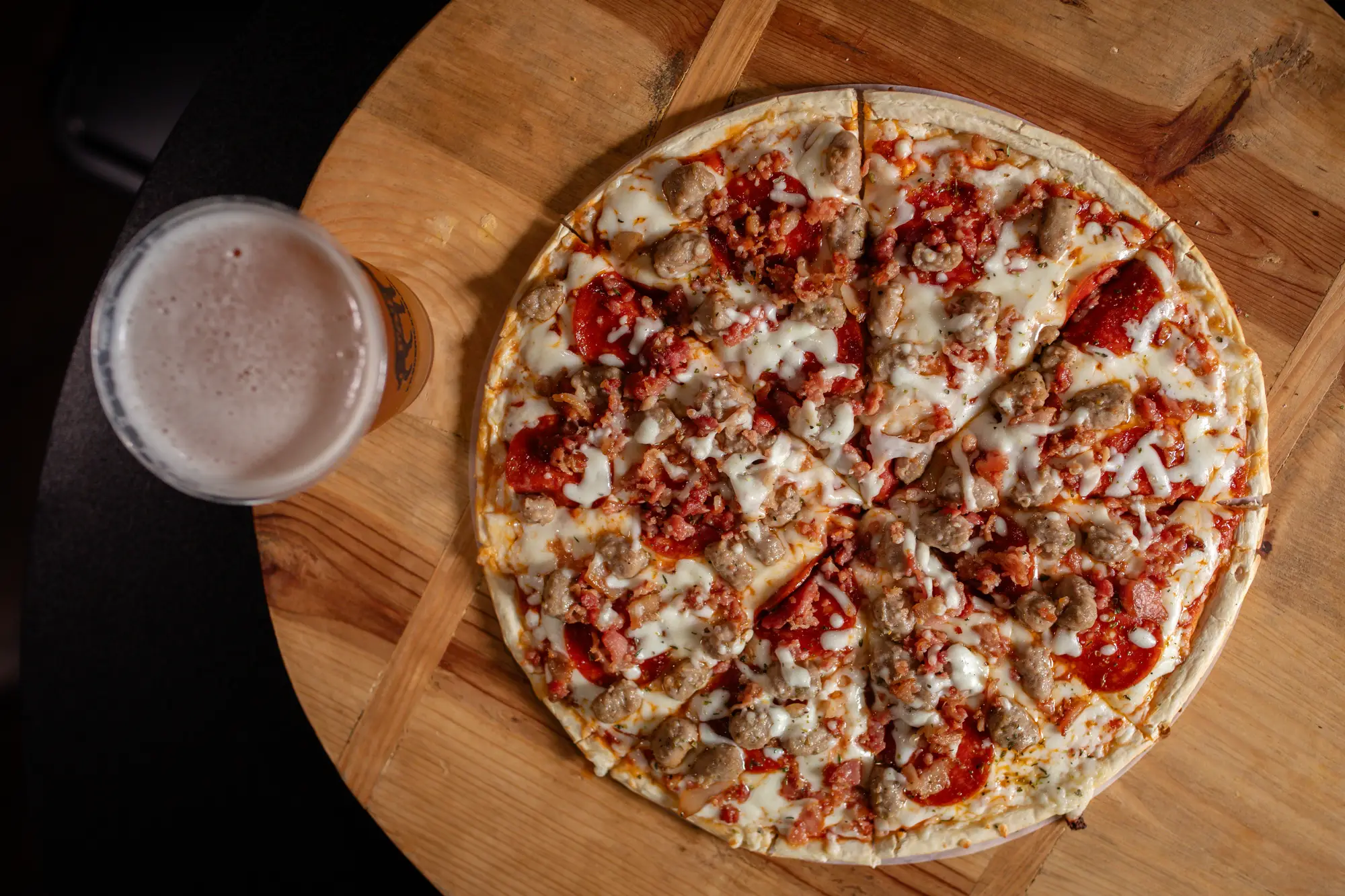Pizza and beer on the menu at Fat Ass